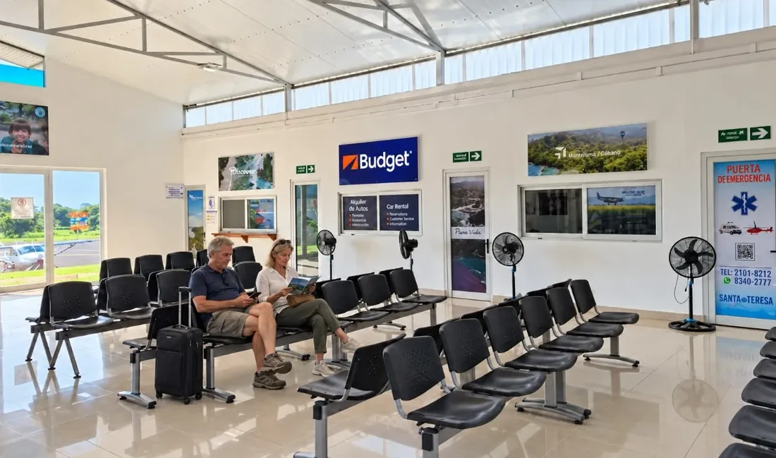 Passengers waiting inside the Cóbano airport terminal near Santa Teresa