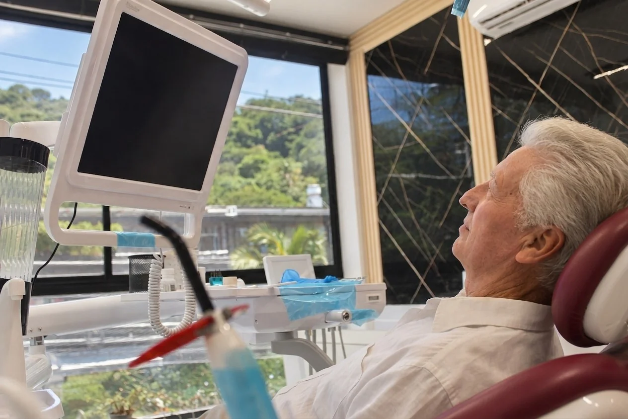 Senior patient relaxing in the dental chair at Esthetic Dent's clinic in Costa Rica