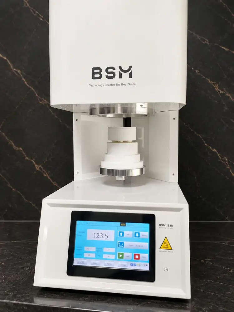 BSM sintering furnace with a zirconia restoration inside at Esthetic Dent